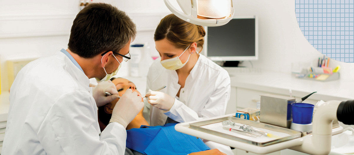 Dentists working on patient