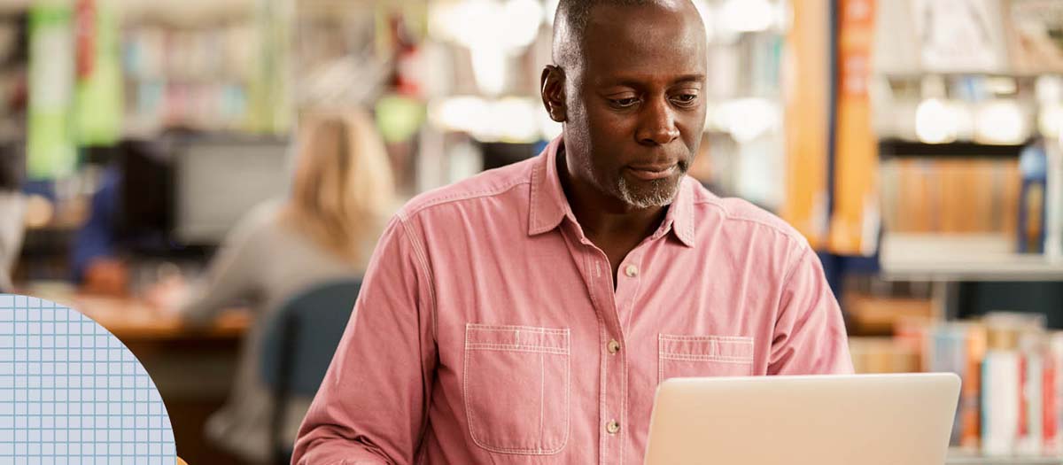 Man researching on his laptop