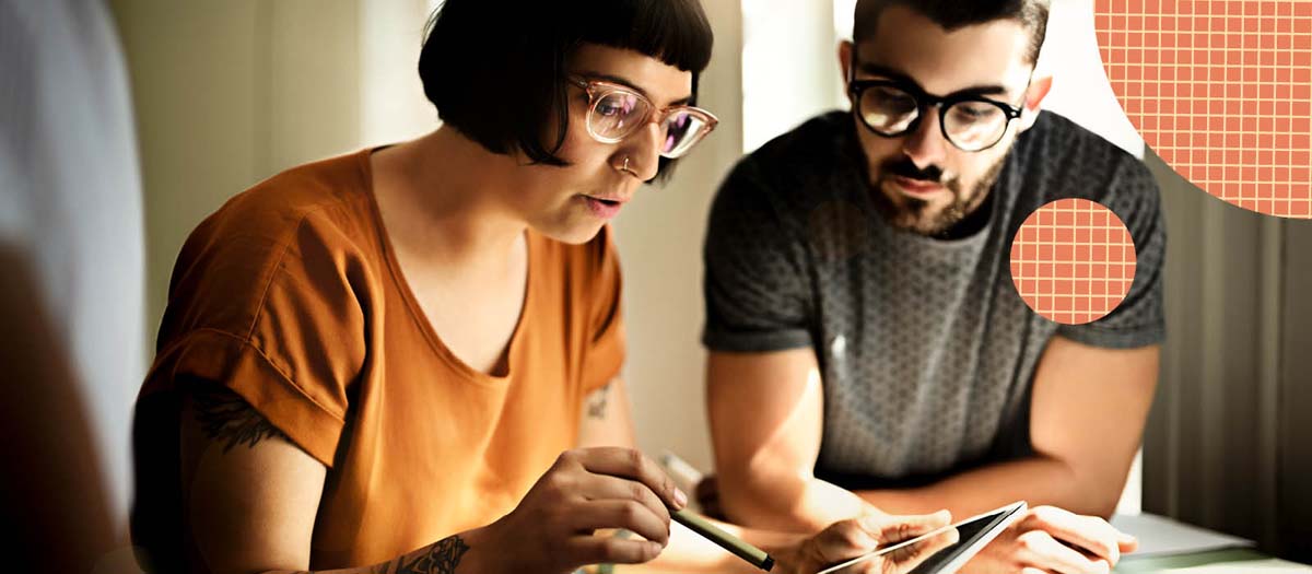 Woman showing client something on an iPad