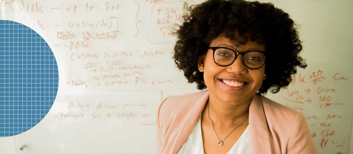 Woman Smiling in Classroom