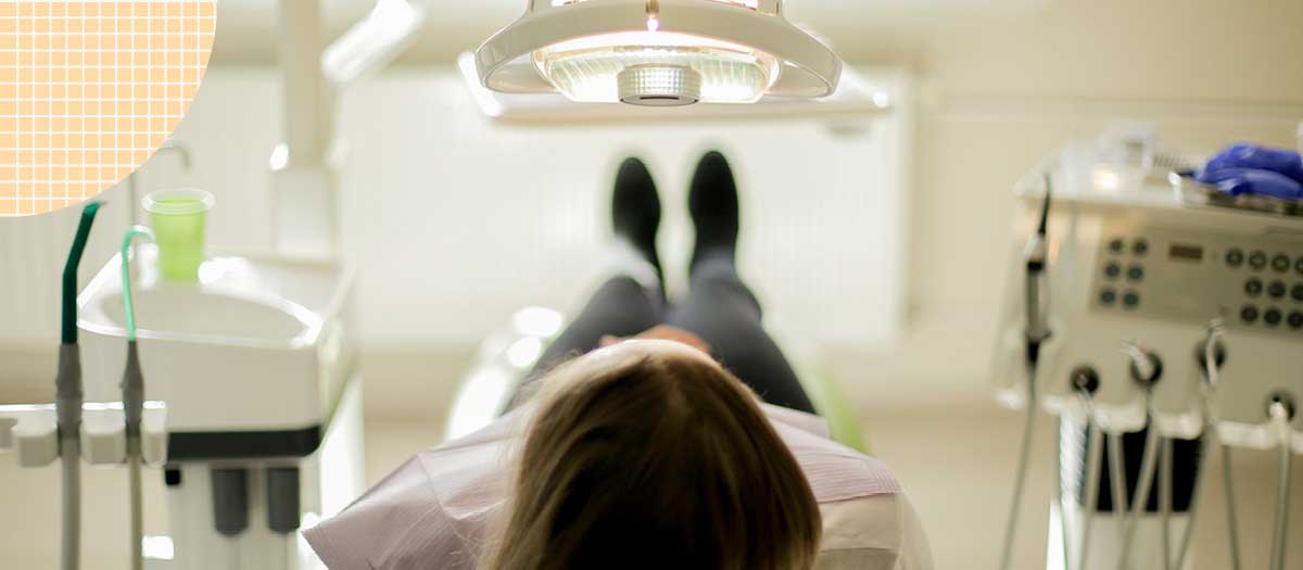 Woman laying in dentist's chair