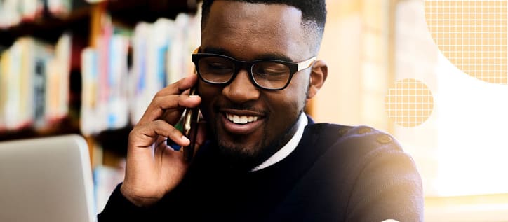 Man with white teeth on phone