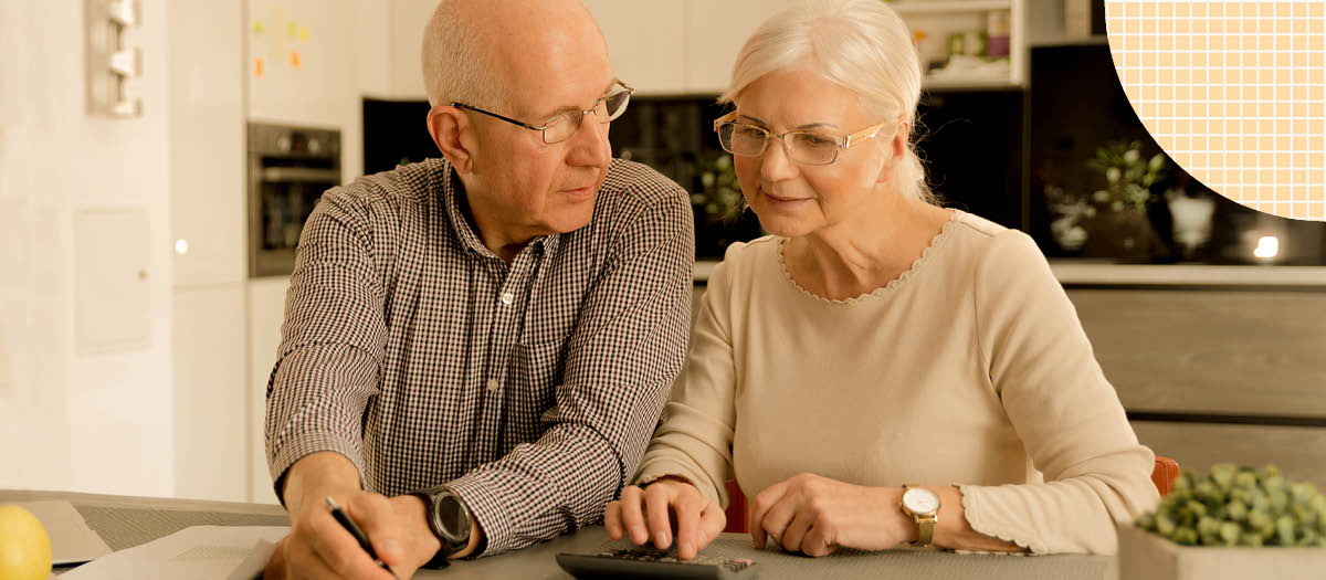 Senior couple looking at paperwork