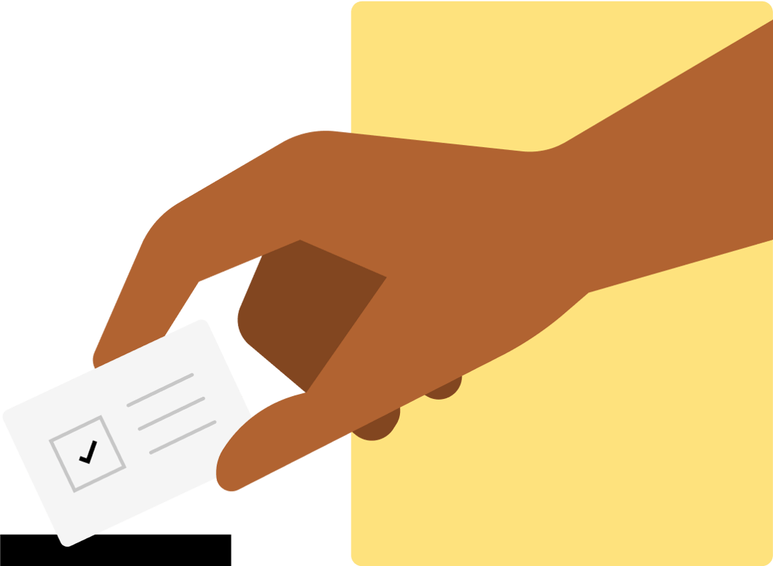 A hand holding a ballot