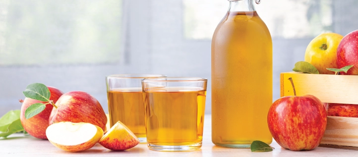 Apple cider drinks on a table