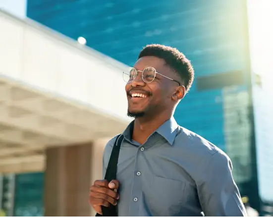 Younger male walking outside