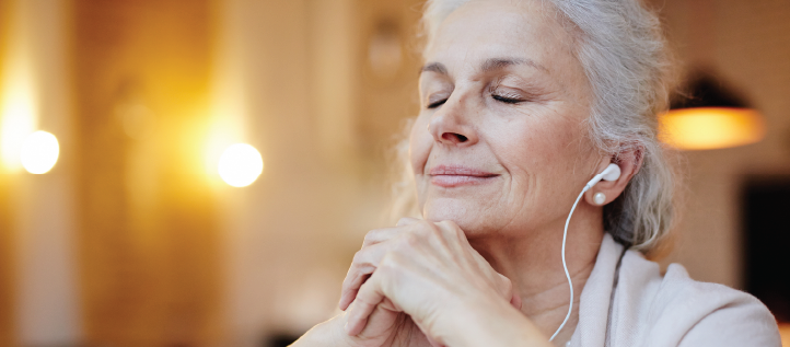 Senior woman wearing ear phones